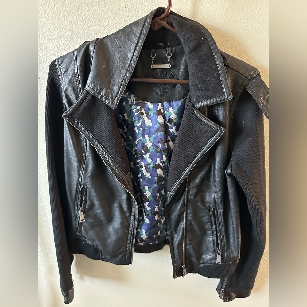 Woman’s black faux leather and cloth jacket. Size medium